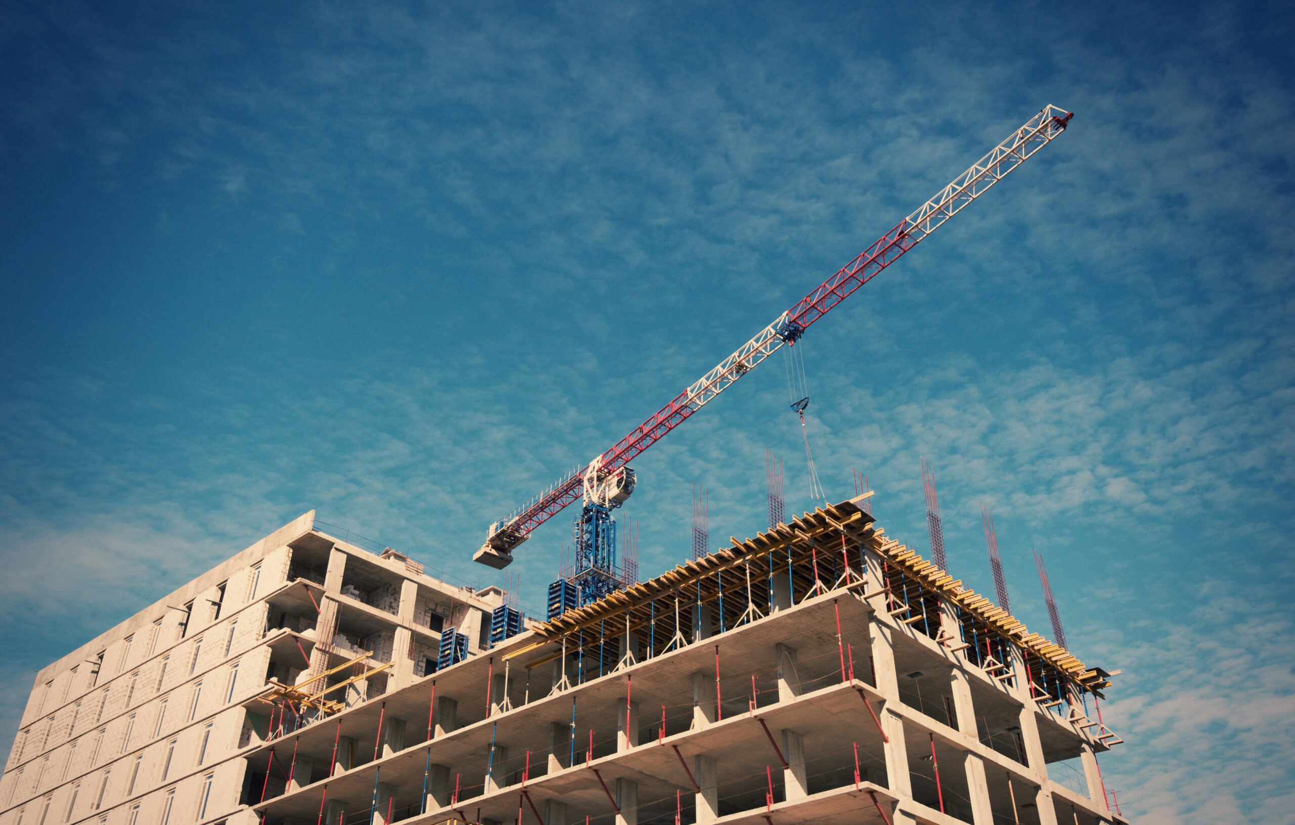 Tax Credit Transfer (TCX) 2 Building Of A Skyscraper By Cranes 2026 01 08 23 54 44 Utc Scaled - Tax Credit Transfer (Tcx) - Tri-Merit